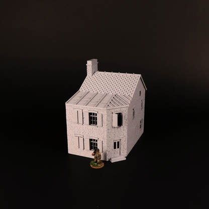 Maison de village avec façade en pierre et volets pour table de jeu historique en 28 mm