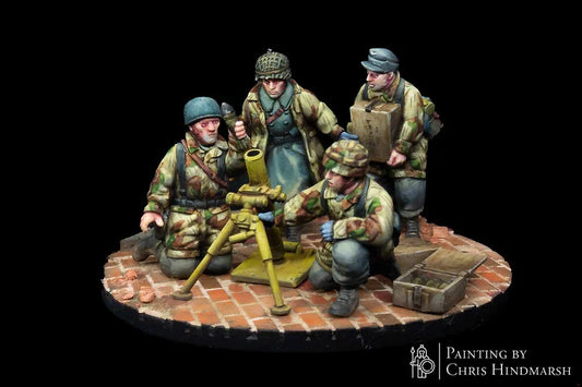 Détail du mortier allemand Granatwerfer 34 (8cm GrW 34) et de son chargeur, figurine historique haute résolution pour wargame, camouflage parachutiste RKX Miniatures.