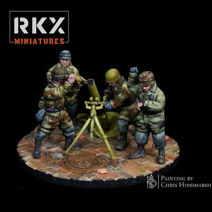 Vue avant de l'équipe de mortier lourd 12cm sGrW 42 Fallschirmjäger pour Bolt Action, artillerie de parachutistes allemands en résine impression 3D, échelle 28mm 1/56, peinture Chris Hindmarsh.
